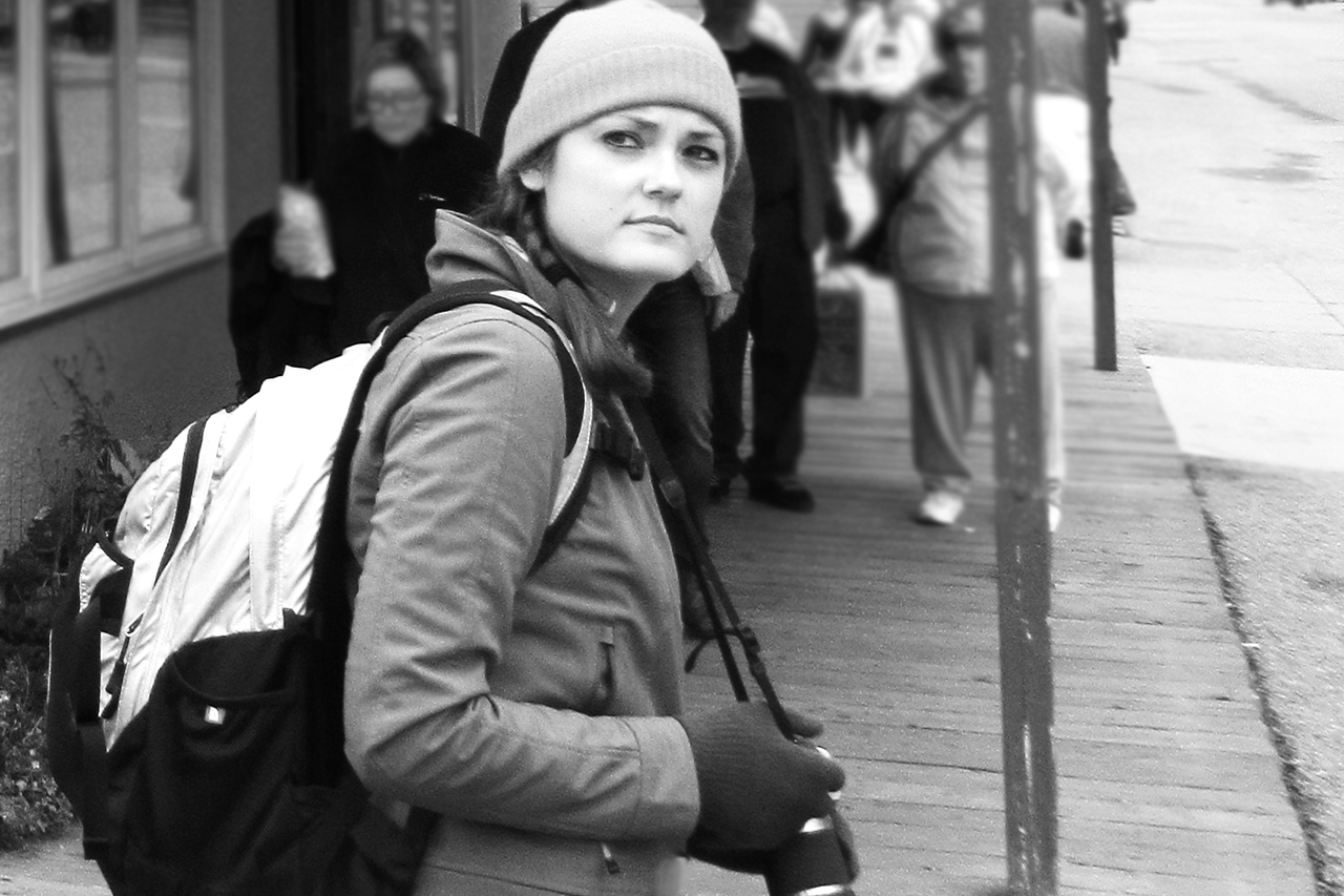 Cheyna Roth on sidewalk in black and white
