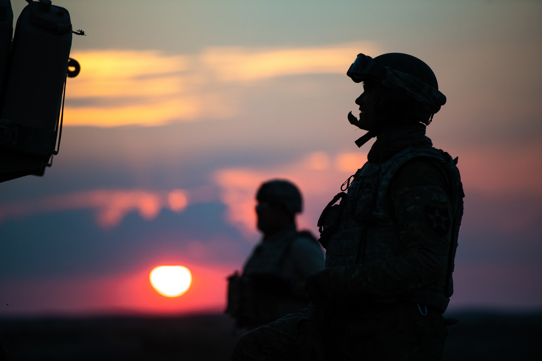 Photo of Michigan National Guard soldiers at sunset